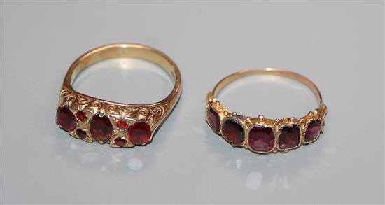 A Victorian garnet five-stone half-hoop ring, yellow metal setting and shank and another 9ct & garnet half-hoop ring.